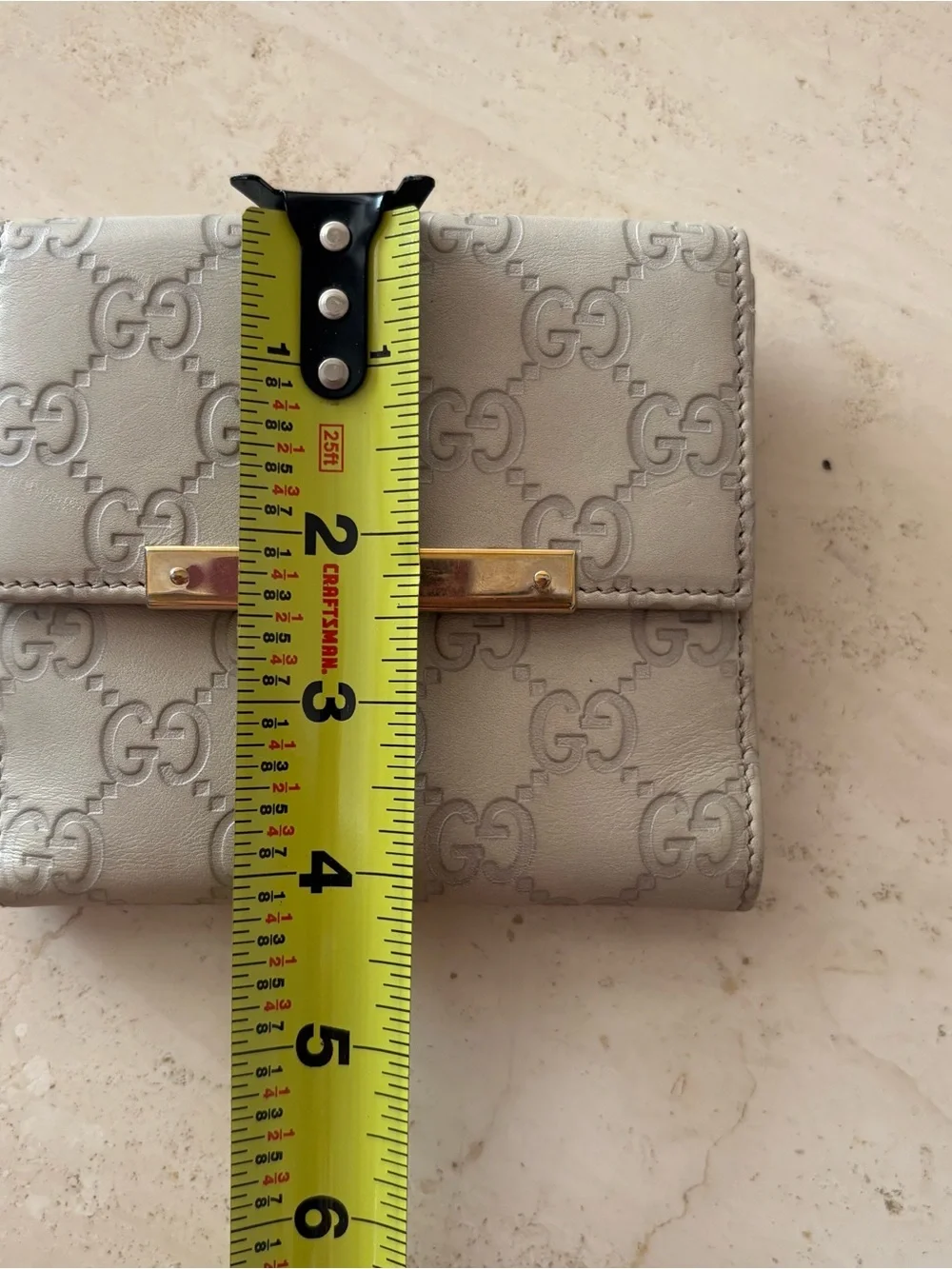 Gucci Embossed GG Leather Wallet with Gold Hardware